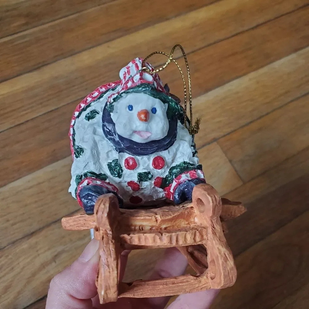 Round large snowman on sled Christmas tree ornament‎